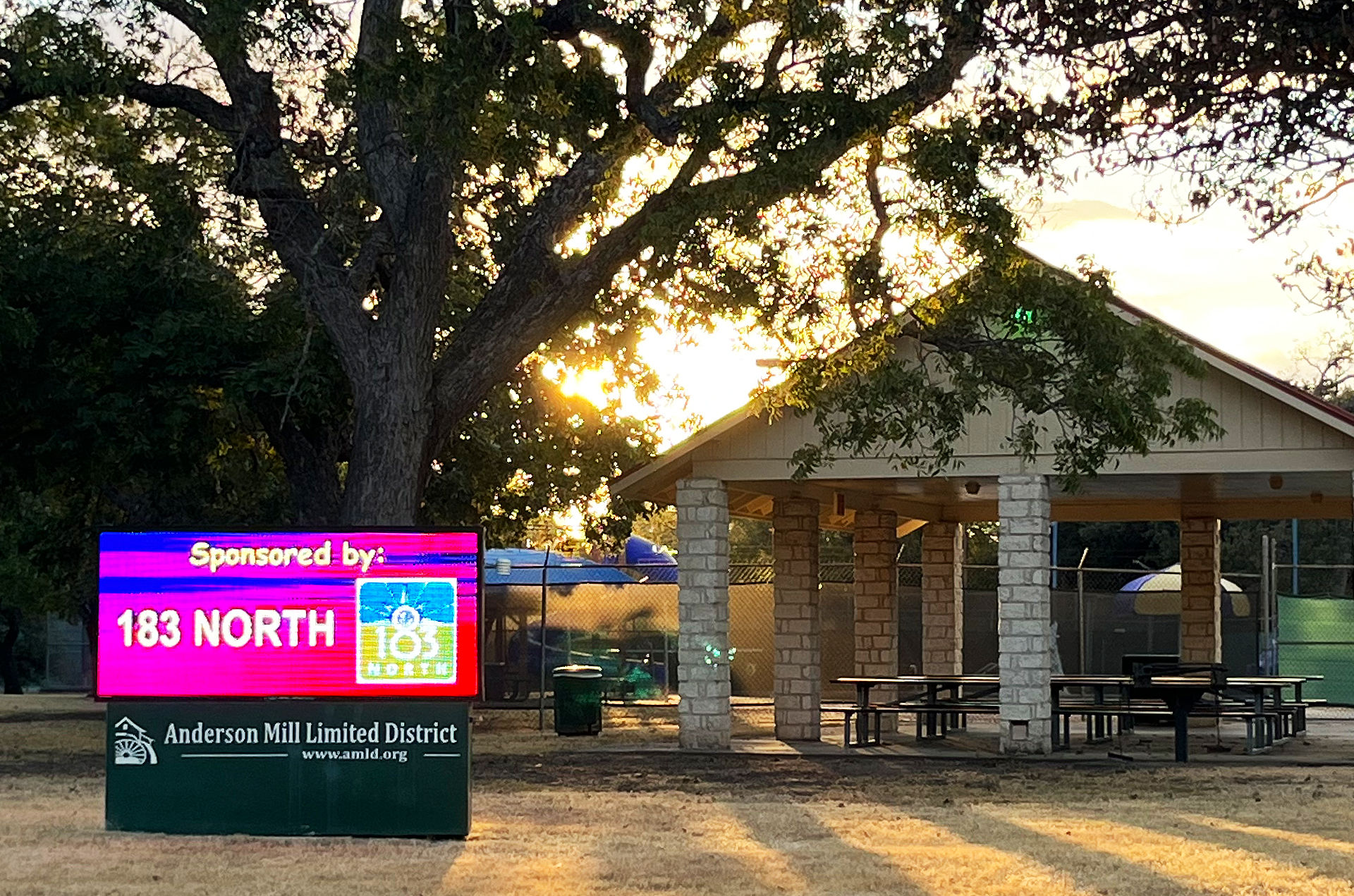 Community center with display advertising the project as a sponsor